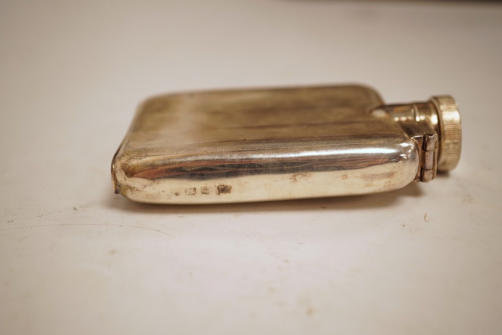 A George V engine turned silver hip flask, William Neale Ltd, Birmingham, 1924, 92mm, 89 grams.